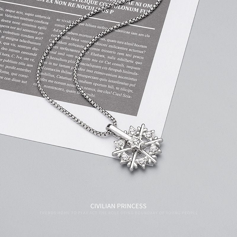 Winter in Motion — Titanium Steel Rotating Snowflake Pendant Necklace